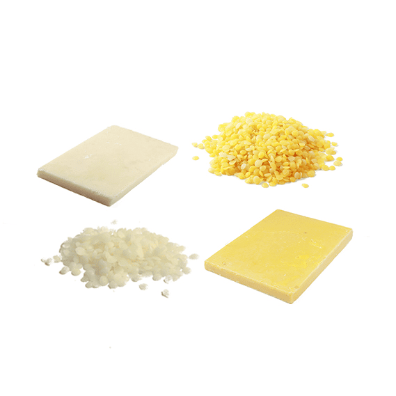 Yellow and white beeswax cakes and pellets